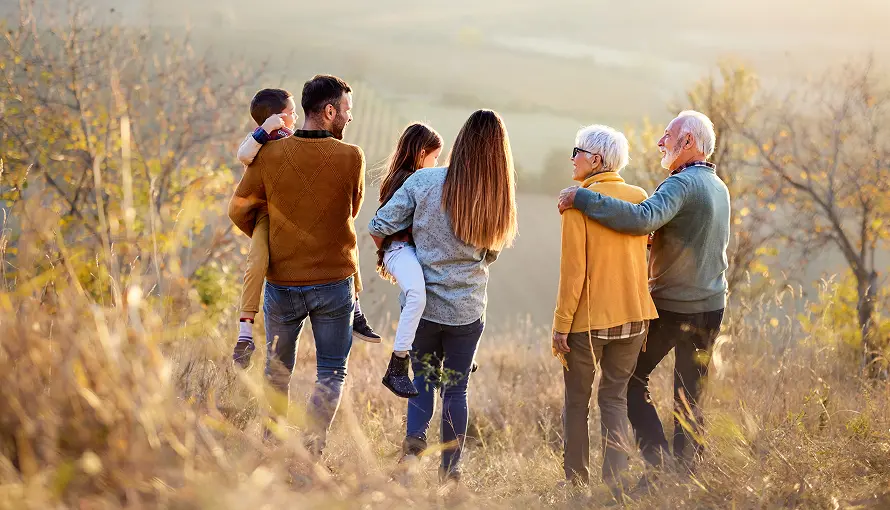 thre generations of a family on a hike